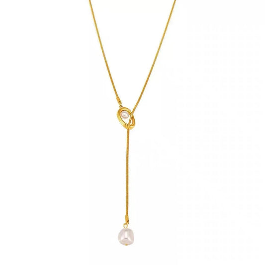 Gold necklace with a pearl pendant on a white background